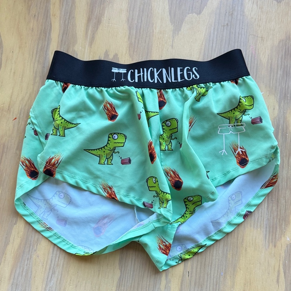 ChicknLegs Women's Athletic Shorts - Green Dinosaur Print